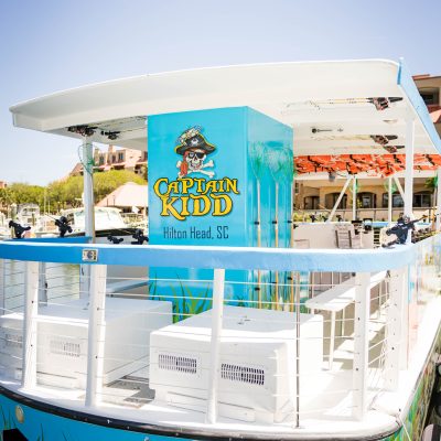 a boat filled with logs