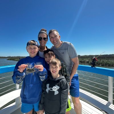 a couple of people that are standing in the snow